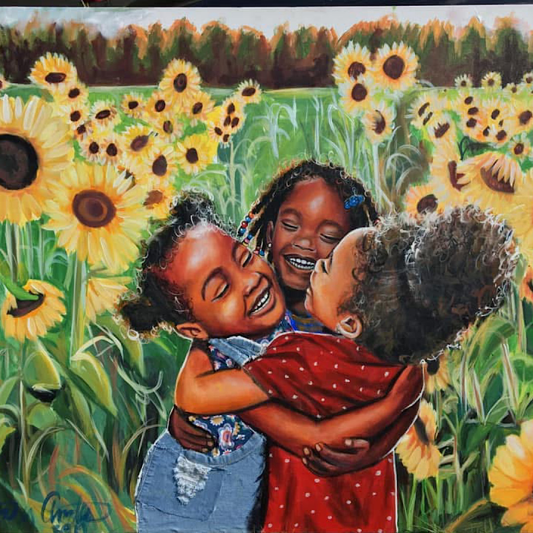 Three children hugging in a sunflower field, smiling and laughing, with bright sunflowers and a green background.