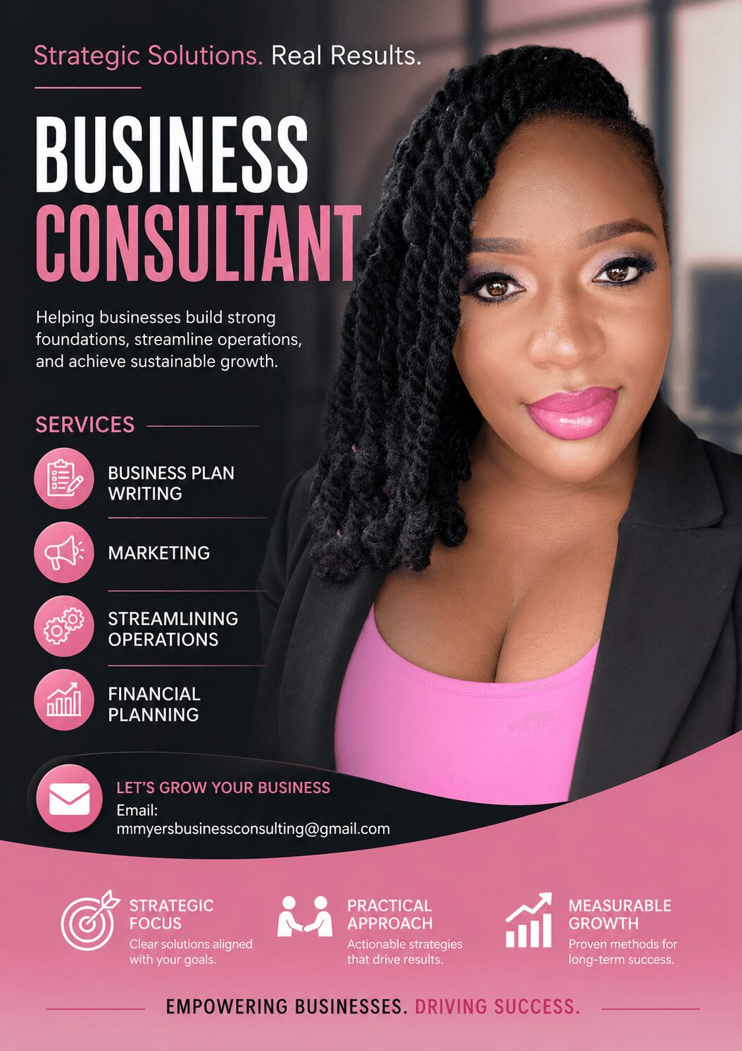 Professional woman with braided hair wearing a black blazer and pink top, smiling against a blurred office background.