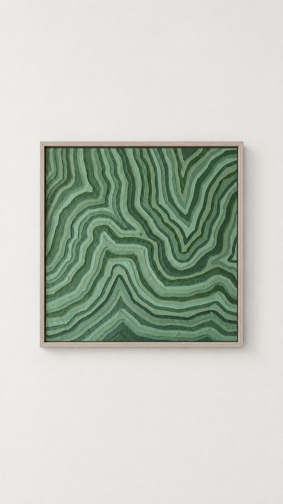 Square framed green abstract artwork with wavy lines on a white wall