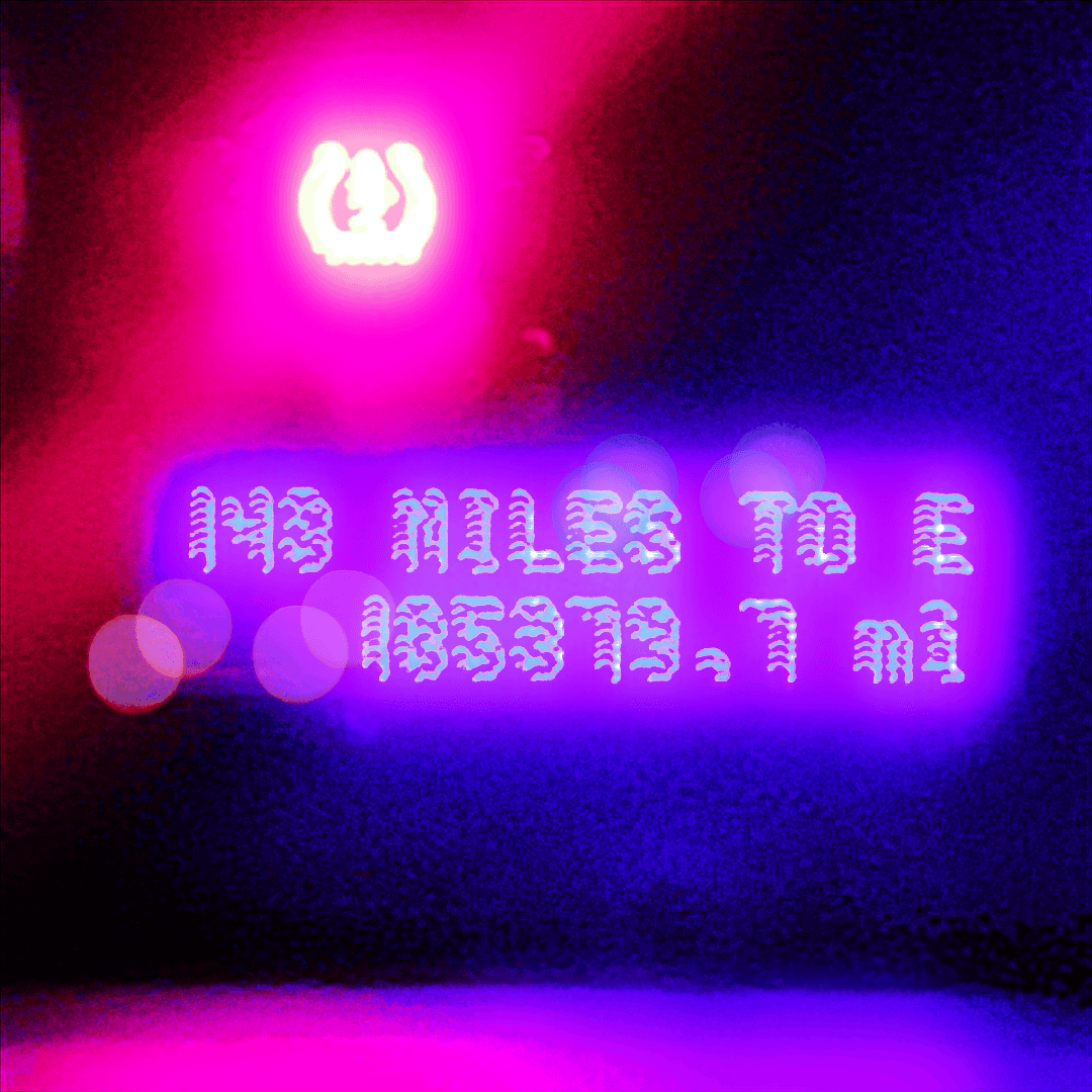 Neon sign with text and a logo, glowing pink and purple, on a dark background.